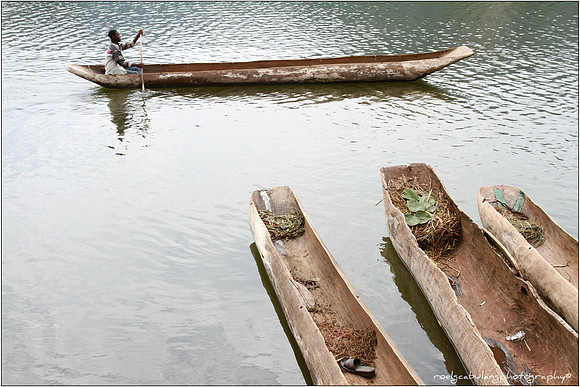 Four Boats and a Boatman